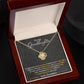 Alt text: "Personalized Granddaughter Necklace in a box, featuring a heart-shaped pendant on an adjustable chain."