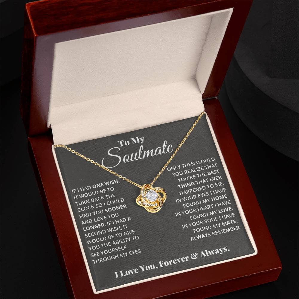A personalized Soulmate Love Knot Necklace, featuring a cushion-cut cubic zirconia pendant set in 14k white gold or 18k gold. Presented in a luxurious mahogany-style box with LED lighting.