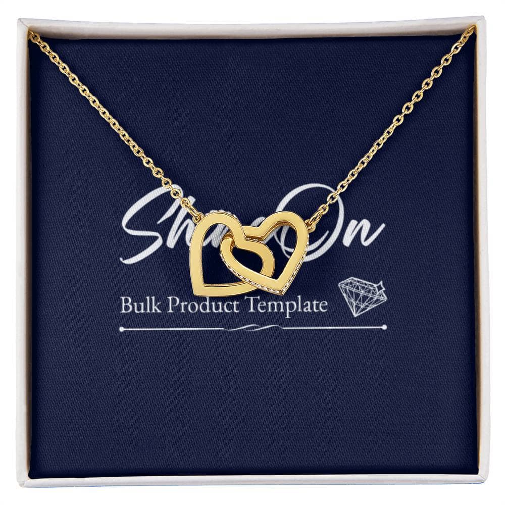 A gold heart necklace with two heart pendants embellished with CZ crystals. Perfect accessory for everyday wear. Adjustable length. Lobster clasp.