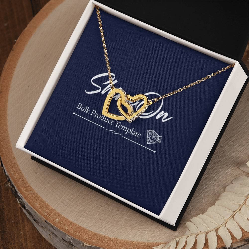 A gold heart necklace in a box, featuring two lovely hearts embellished with CZ crystals. Perfect for everyday wear, this Interlocking Hearts necklace symbolizes never-ending love. Give a memorable anniversary or special birthday gift with this stunning necklace.