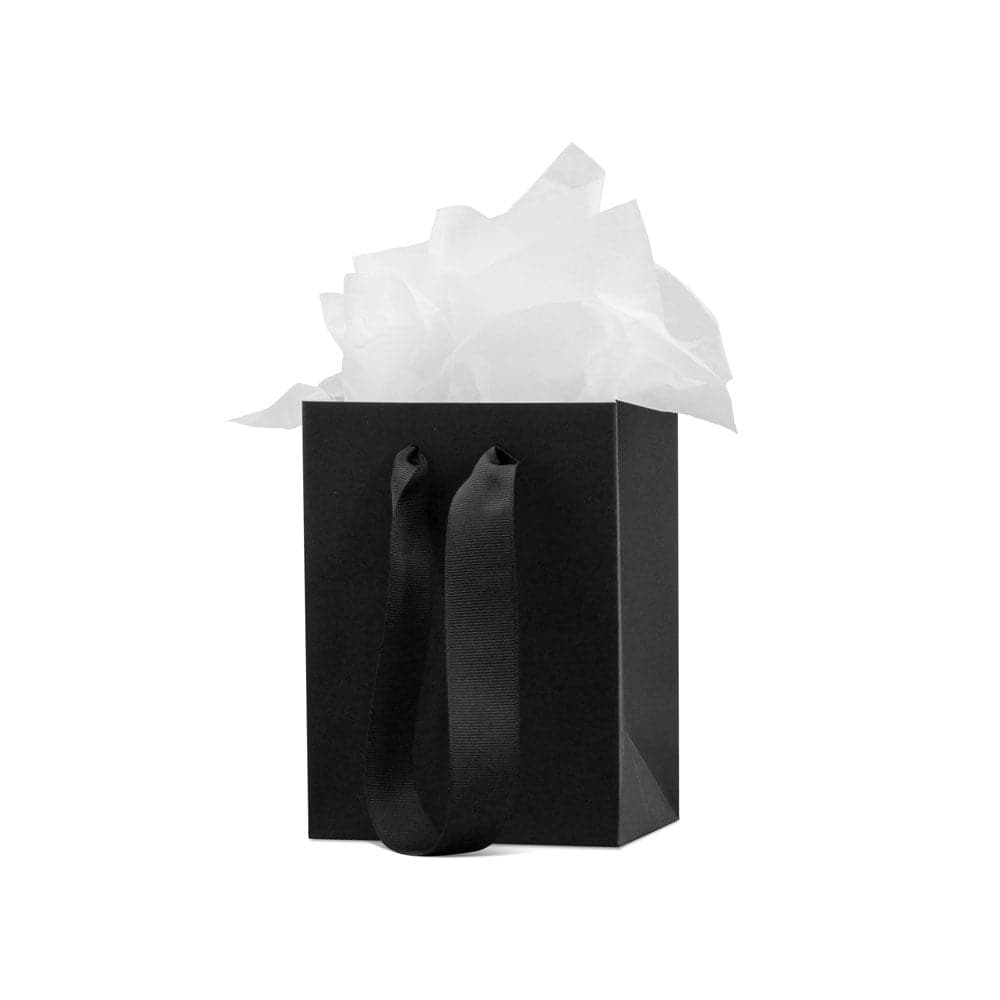 A close-up of a black bag with white tissue paper and a black ribbon, perfect for gift wrapping.