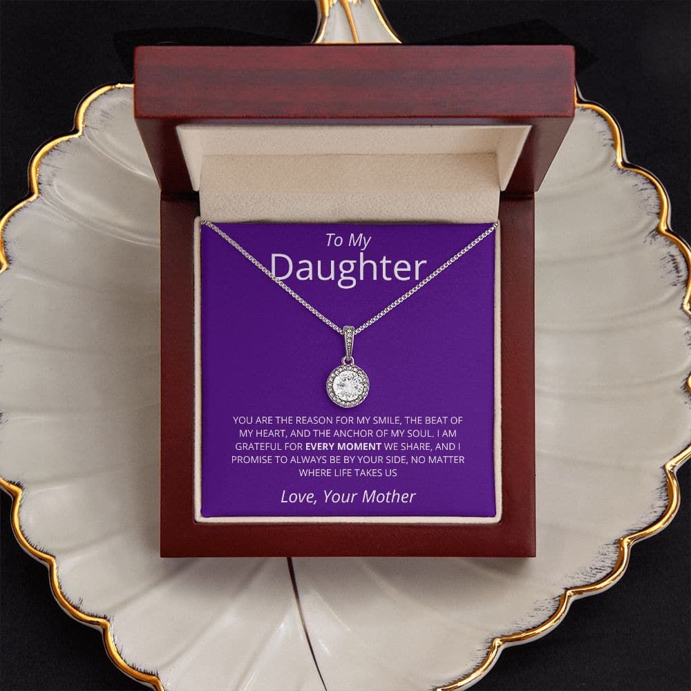 Premium Personalized Daughter Necklace With Heart Pendant, a necklace in a box on a plate, expressing boundless love and enduring bond between parent and daughter.