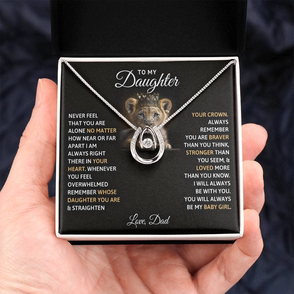 Alt text: "A hand holding a 'To My Daughter' necklace in a luxury box with LED lights"