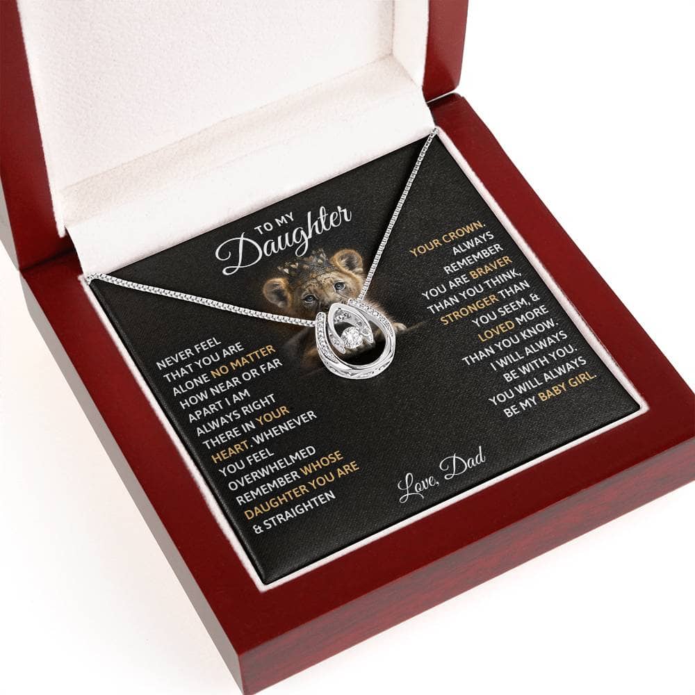 Alt text: "Personalized Daughter Necklace: Always My Baby Girl - A necklace in a box, featuring a heart-shaped pendant with a cushion-cut cubic zirconia. Presented in a mahogany-styled luxury box with LED lighting. Perfect for birthdays, graduations, and special occasions. Crafted with love by Bespoke Necklaces."