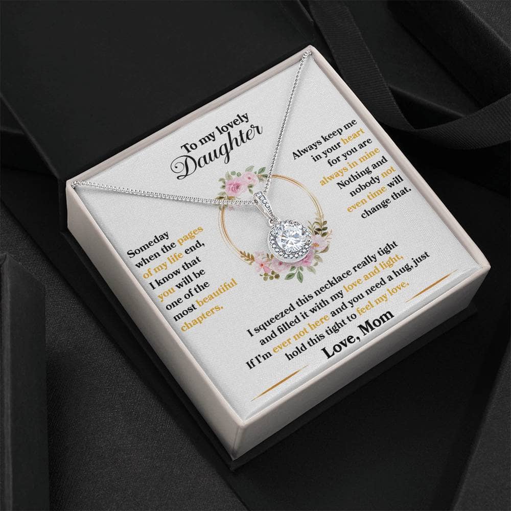 A necklace in a box, symbolizing an unbreakable bond of love. Made with premium materials and adorned with cubic zirconia, this Personalized Daughter Necklace is a celebration of the parent-daughter relationship. Adjustable chain for comfort and style. Comes in a luxurious mahogany-style box with LED lighting.