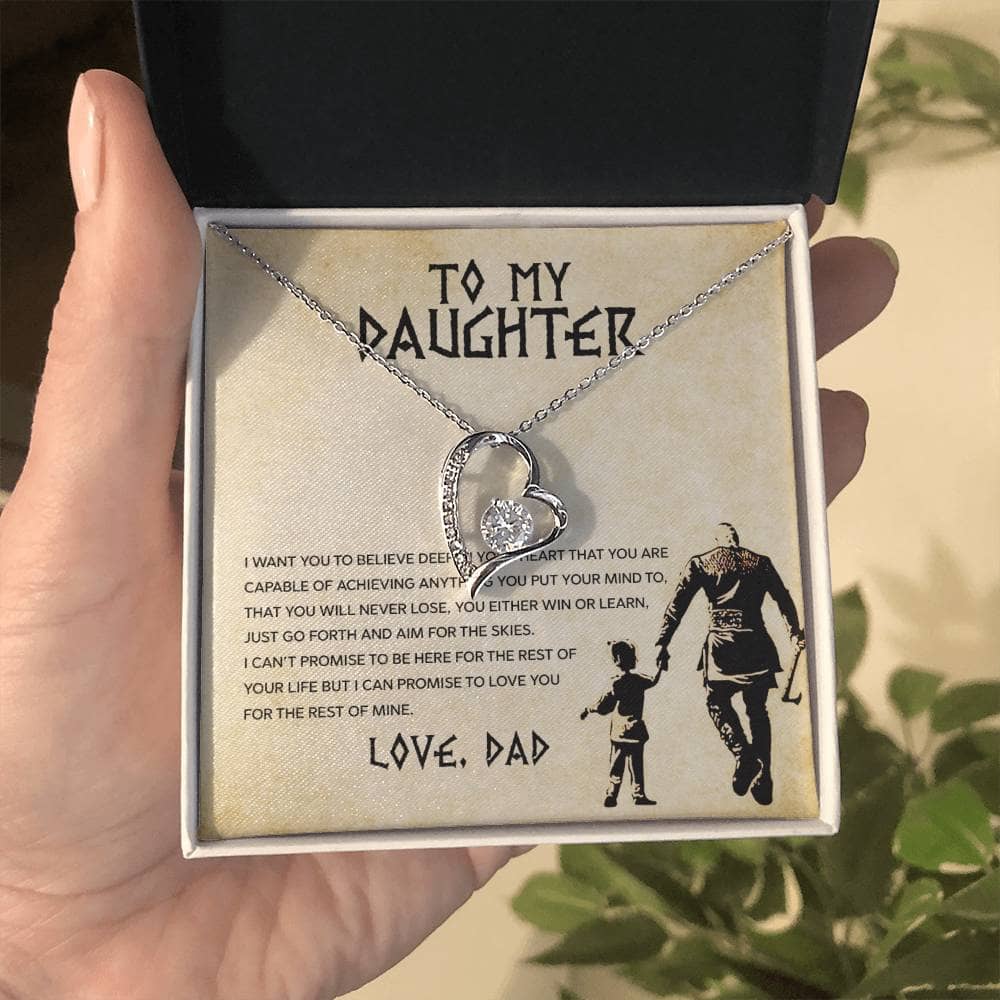 Alt text: "Hand holding Personalized Daughter Necklace in box, heart-shaped pendant symbolizing parent-daughter bond."