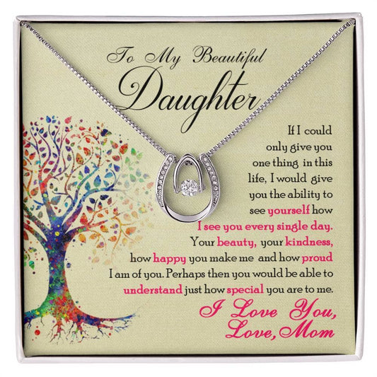 A personalized daughter necklace with an elegant cubic zirconia heart pendant in a luxurious mahogany-styled box with LED lighting.