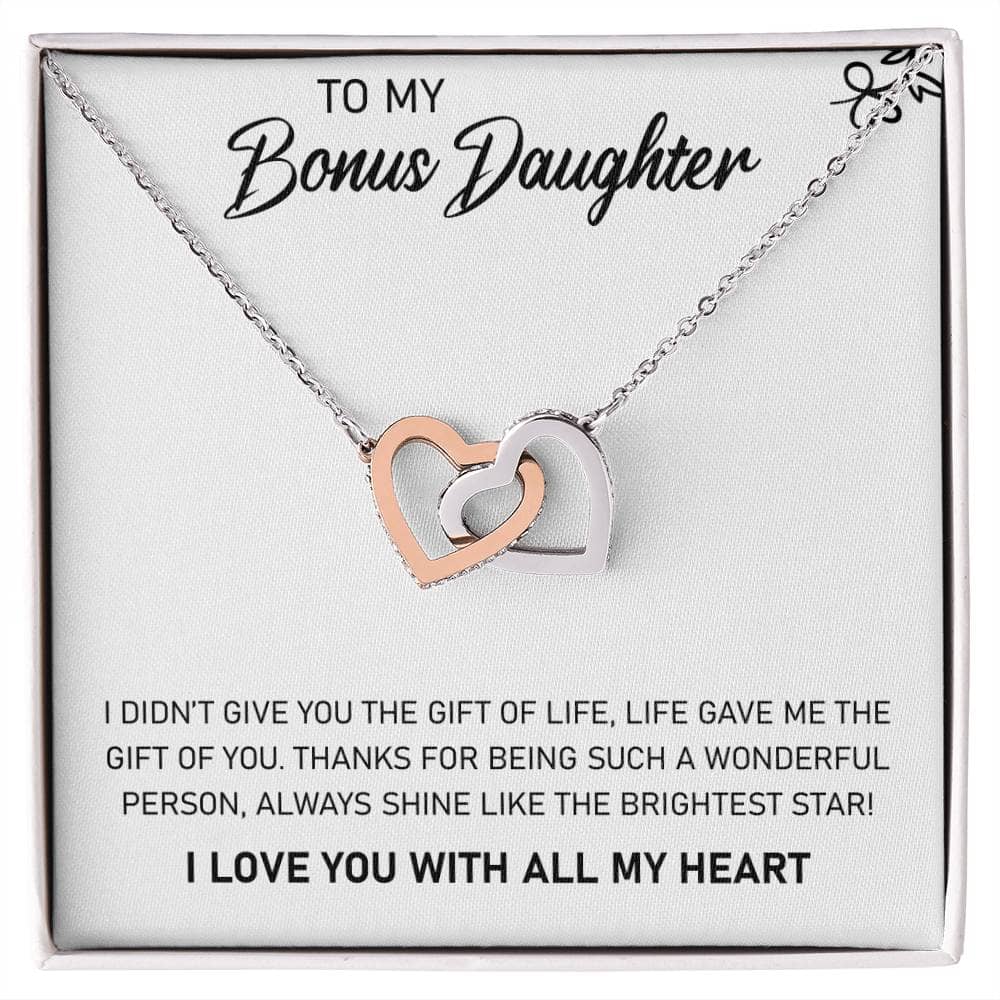 Alt text: "Personalized Daughter Necklace - Delicate necklace in a box, adorned with heart-shaped pendants and cubic zirconia, symbolizing the enduring bond between a parent and a daughter."