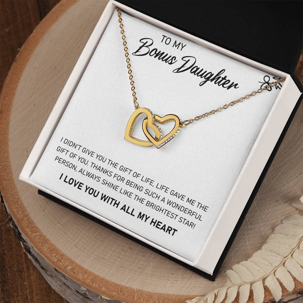 Alt text: "Personalized Daughter Necklace - Delicate necklace in a box with heart-shaped pendant adorned with cubic zirconia crystals"