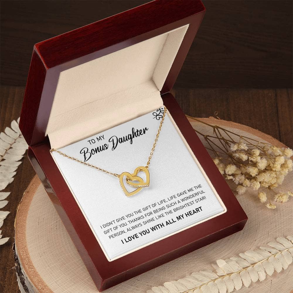 A necklace in a box - Personalized Daughter Necklace - Elegant Design, adorned with cushion-cut cubic zirconia, symbolizing the enduring bond between a parent and a daughter.