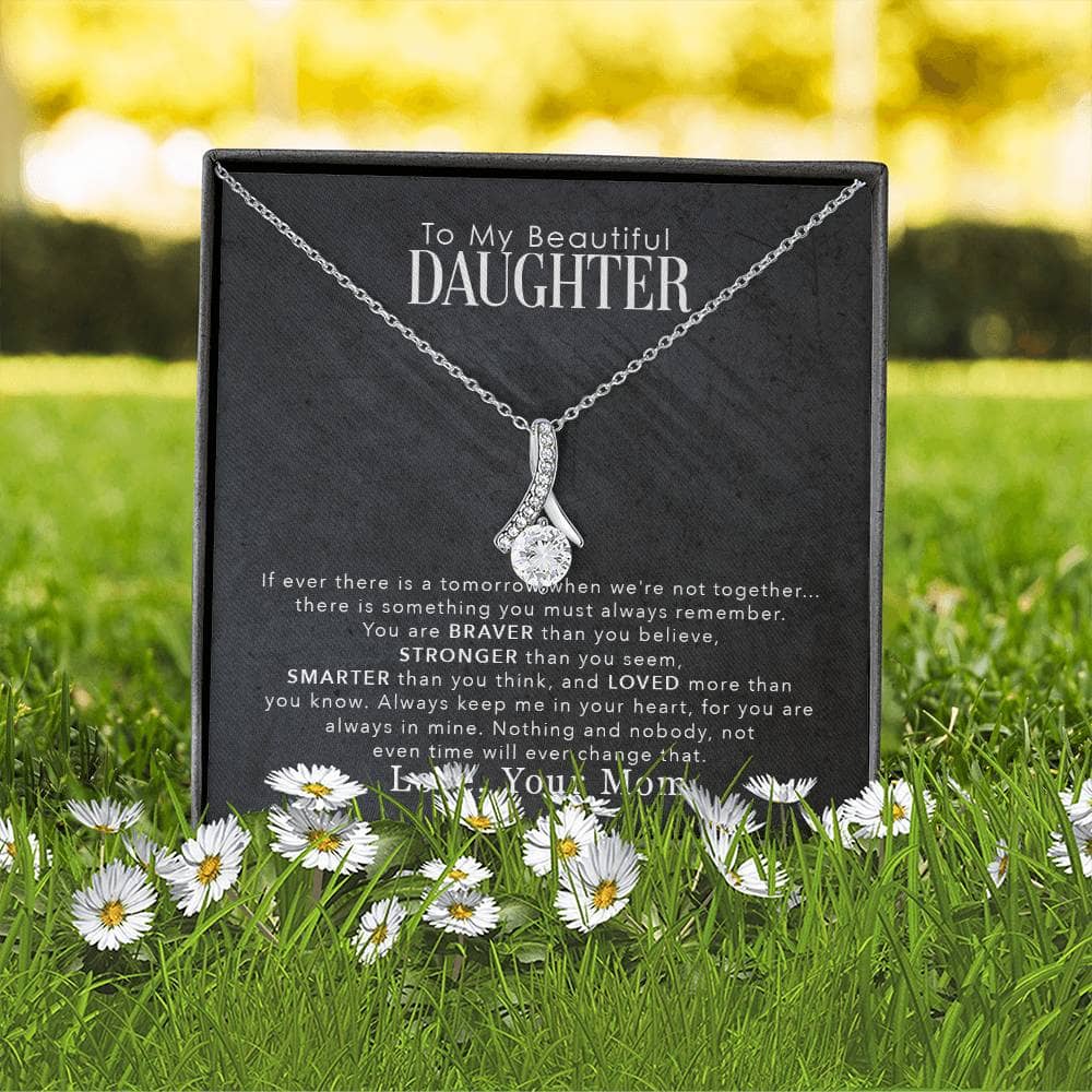 Alt text: "To My Daughter" necklace in a black box with a heartfelt message