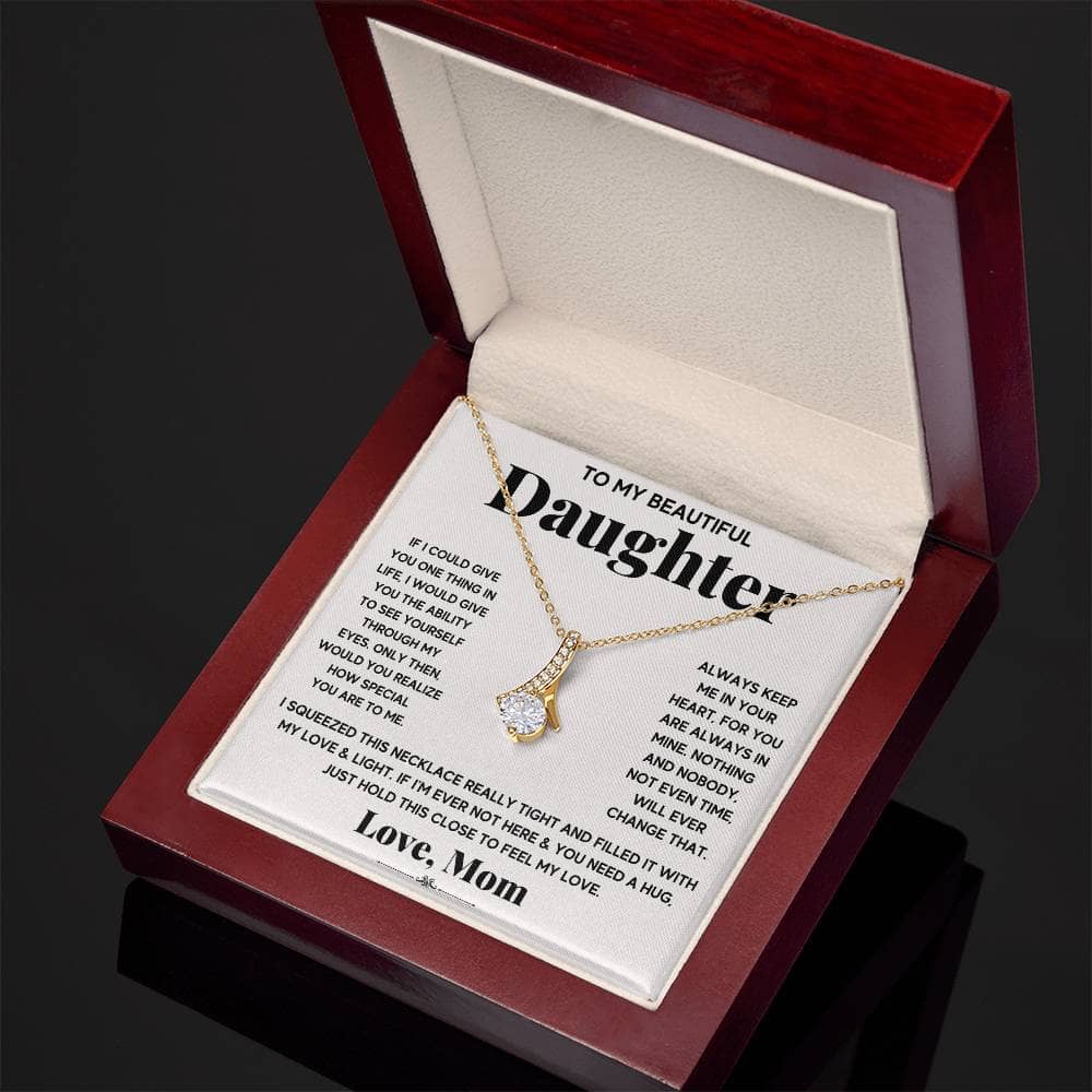 A necklace in a box, symbolizing the enduring bond between parents and daughters. Crafted with exquisite finesse, featuring a heart-shaped pendant and adjustable chain. Luxurious unboxing experience with a mahogany-style box and LED lighting. Perfect gift for special occasions.
