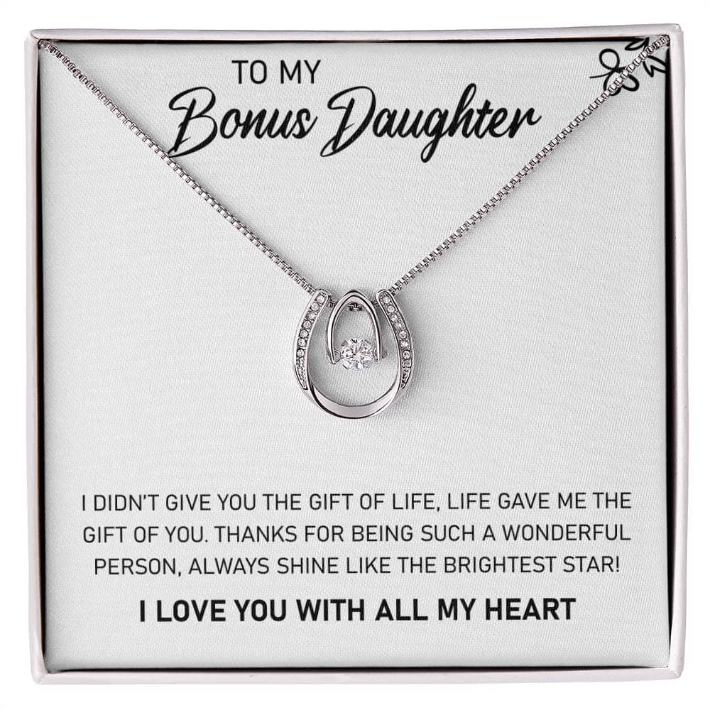 Alt text: "Personalized Daughter Necklace - Elegant Tribute to Parental Love, necklace in a box with heart-shaped pendant and cushion-cut cubic zirconia."