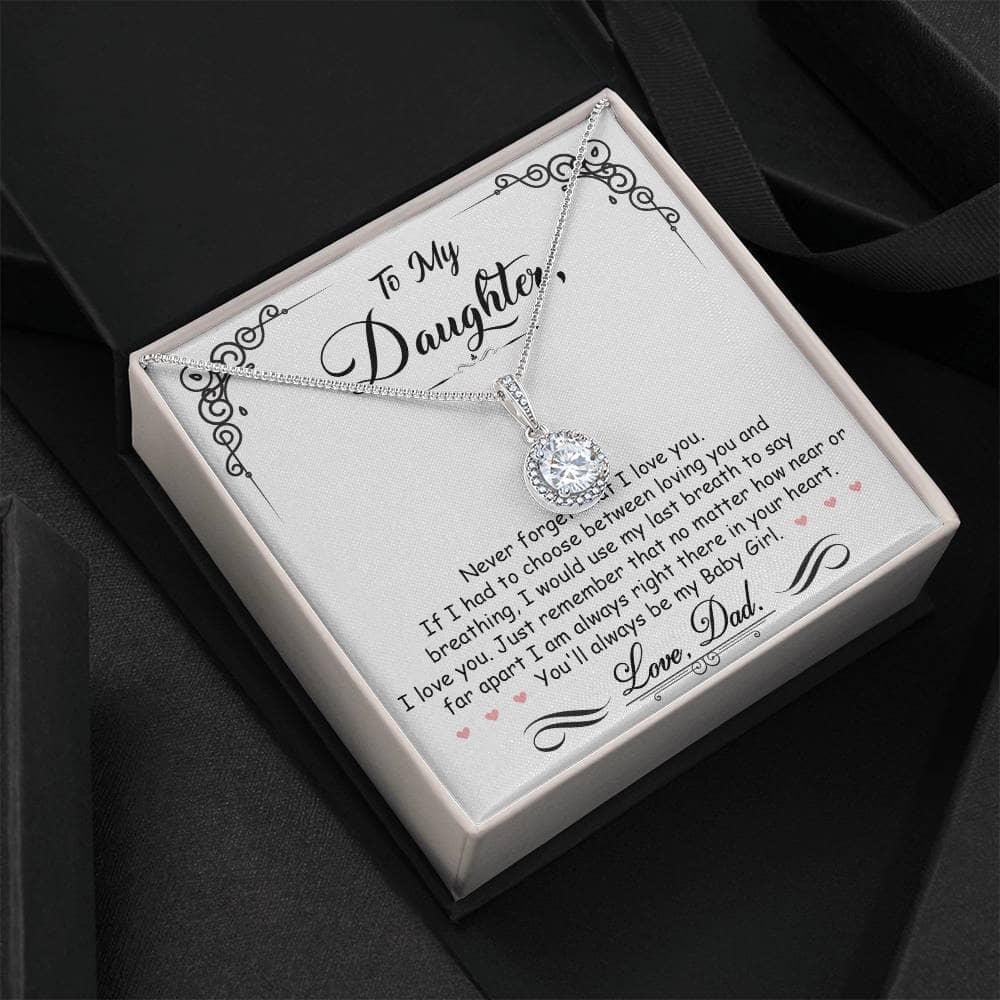 A personalized Daughter Necklace: Eternal, in a box, symbolizing the unbreakable bond between parent and daughter. Crafted with elegance and durability, featuring a heart-shaped pendant. Choose between classic cable or modern box chain. Presented in a luxurious mahogany-style box with LED lighting. Perfect for marking milestones or as a gesture of affection.