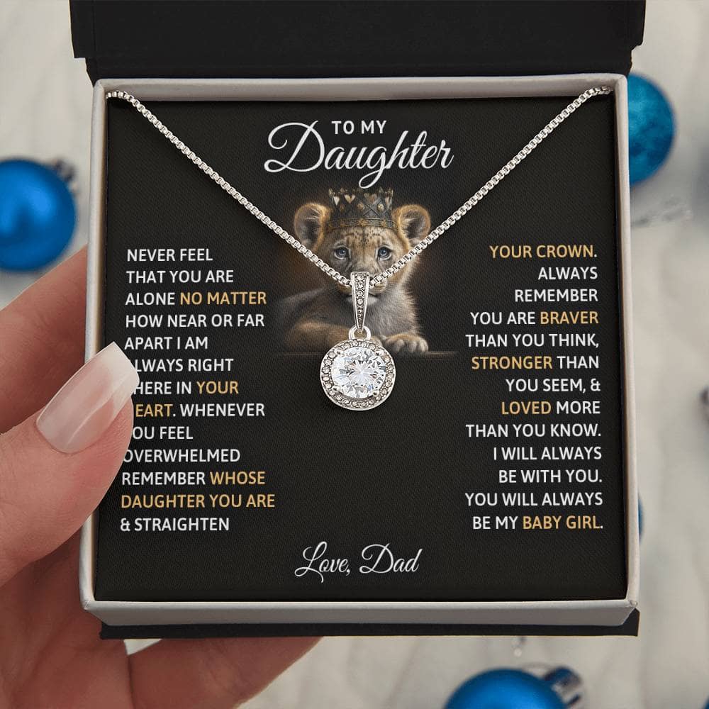 Alt text: "A hand holding a Personalized Daughter Necklace - Eternal Hope Design in an elegant box with LED lighting"