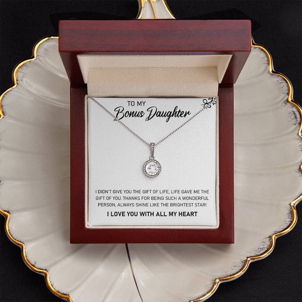 Alt text: "Personalized Daughter Necklace - A necklace with a diamond pendant in a box, symbolizing the unending love and bond between a parent and a daughter."