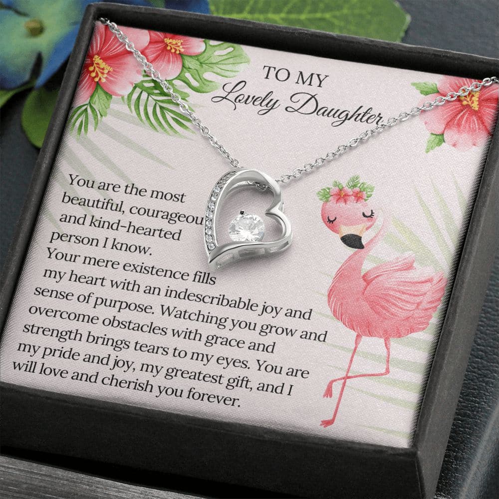 A close-up of a Personalized Daughter Necklace - Forever Love, featuring a heart-shaped pendant with a cushion-cut cubic zirconia stone.