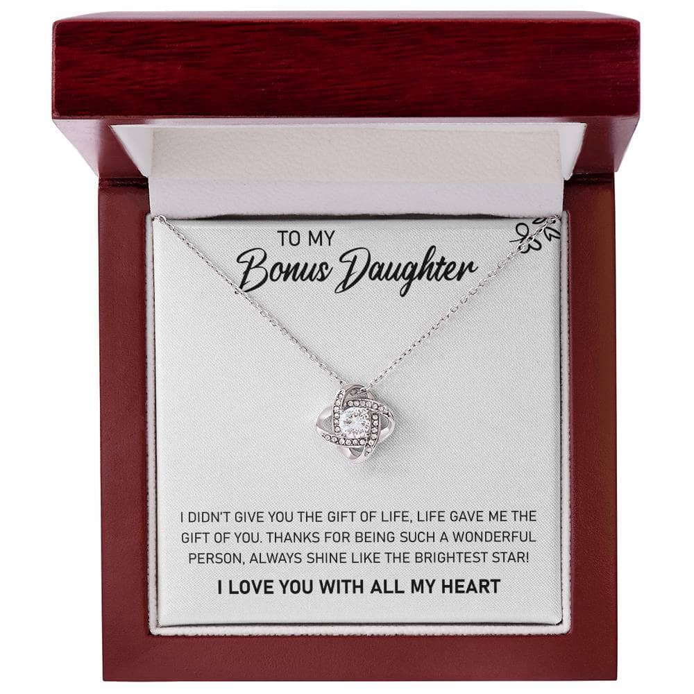 Alt text: "Personalized Daughter Necklace: Heartfelt, a silver necklace with a diamond in a box"