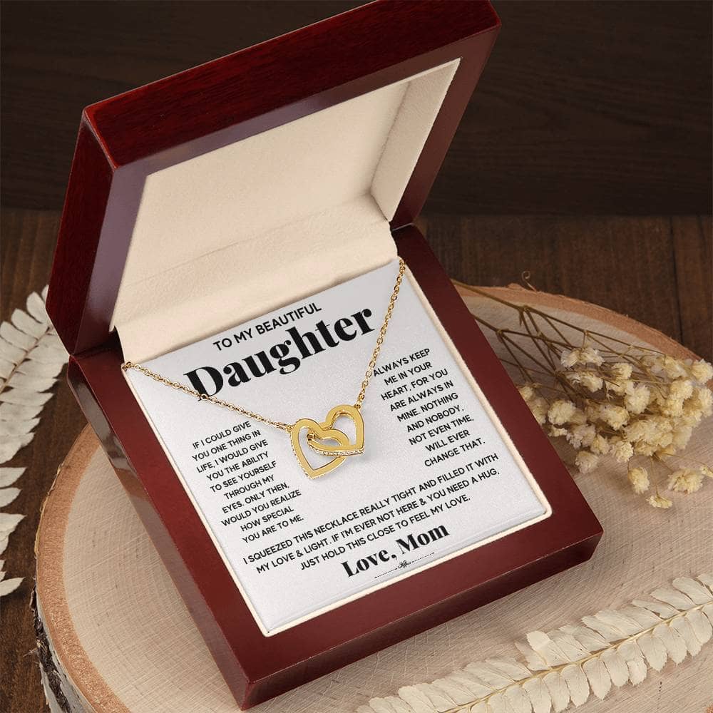 Alt text: "Personalized Daughter Necklace - Interlocking Hearts in a box"