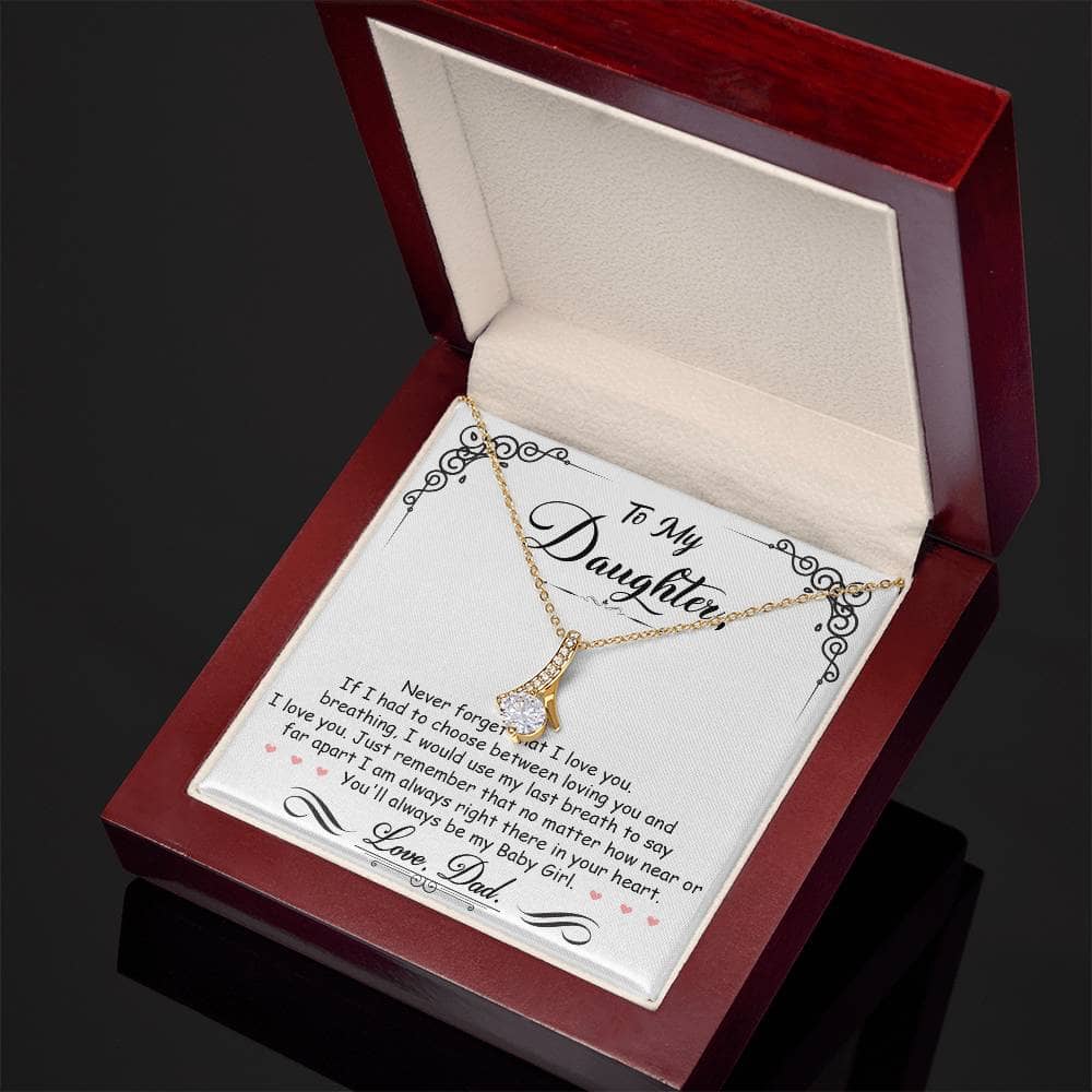Alt text: "Personalized Daughter Necklace: Love Bond - a gold necklace in a box with cushion-cut cubic zirconia pendant, symbolizing the enduring bond between parents and daughters."