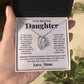 Alt text: "A hand holding a personalized daughter necklace in a box"