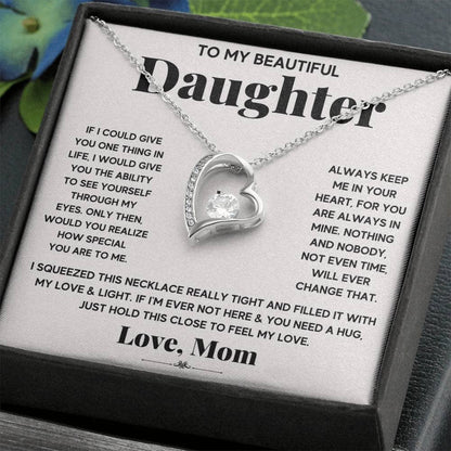 Alt text: Personalized Daughter Necklace: Loving Embrace - A cherished necklace in a box, featuring a heart-shaped pendant and adjustable chains, symbolizing the unbreakable bond between parents and daughters.