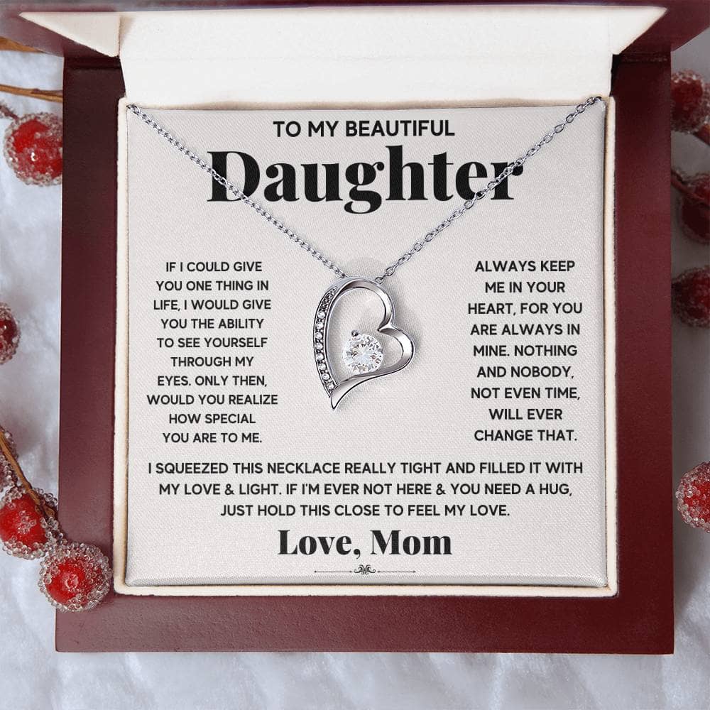 Image alt text: "A personalized 'To My Daughter' necklace in a mahogany-style box with LED lighting."