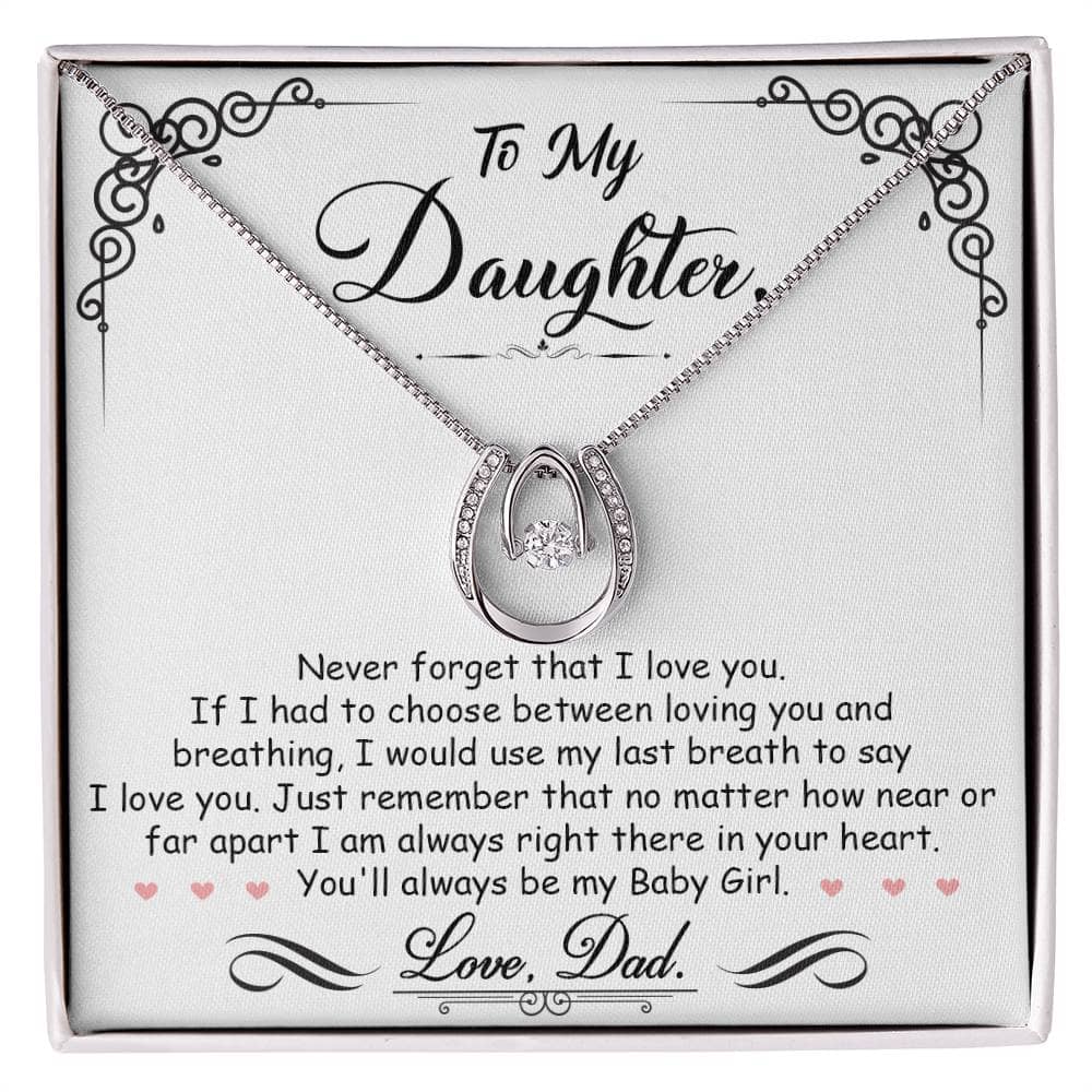 Alt text: "Personalized Daughter Necklace: Heart-shaped pendant with cubic zirconia in a box"