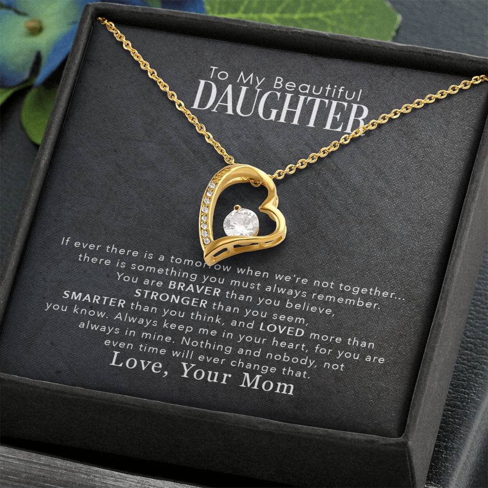 Alt text: "Personalized Daughter Necklace: A heart-shaped pendant with a gold finish and diamond, packaged in a luxury box with LED lighting."