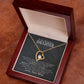 Alt text: "Personalized Daughter Necklace: Premium heart-shaped pendant in a luxury box with LED lighting, showcasing a gold heart with a diamond. Symbolizes parent-daughter love bond."