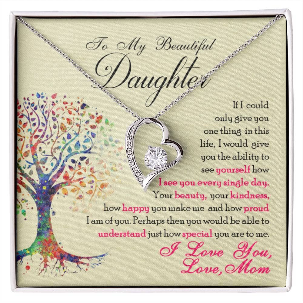 Alt text: "Personalized 'To My Daughter' Necklace in a box, featuring a heart-shaped diamond pendant. Symbolic representation of love and affection between parent and child. Adjustable chain for comfort. Premium craftsmanship and elegant design."