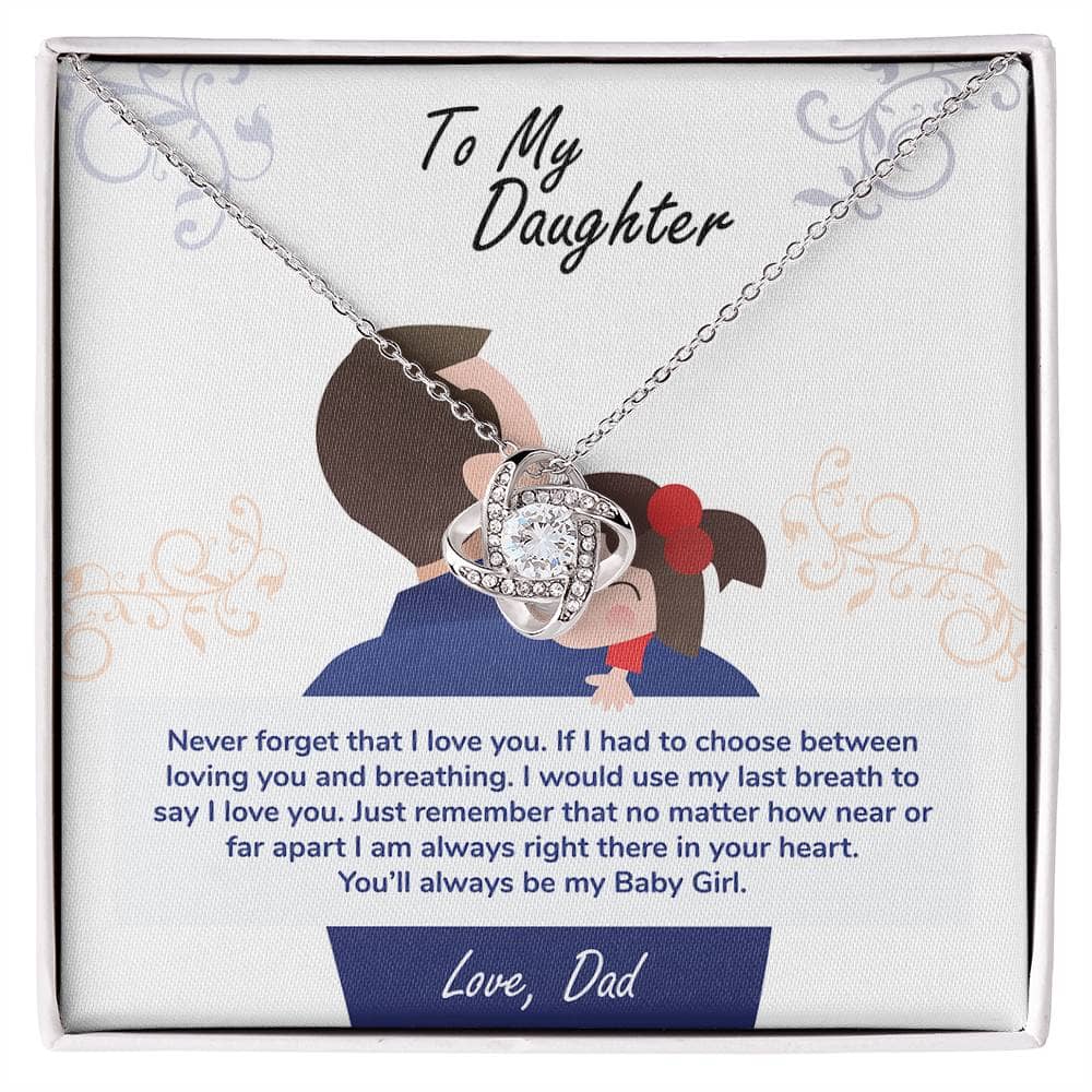 Alt text: "Close-up of a personalized 'To My Daughter' necklace in a box, featuring a heart-shaped pendant with a cushion-cut cubic zirconia centerpiece."