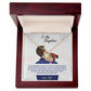 Alt text: "Personalized Daughter Necklace: A gold necklace with a diamond pendant in a mahogany-style box with LED lighting."