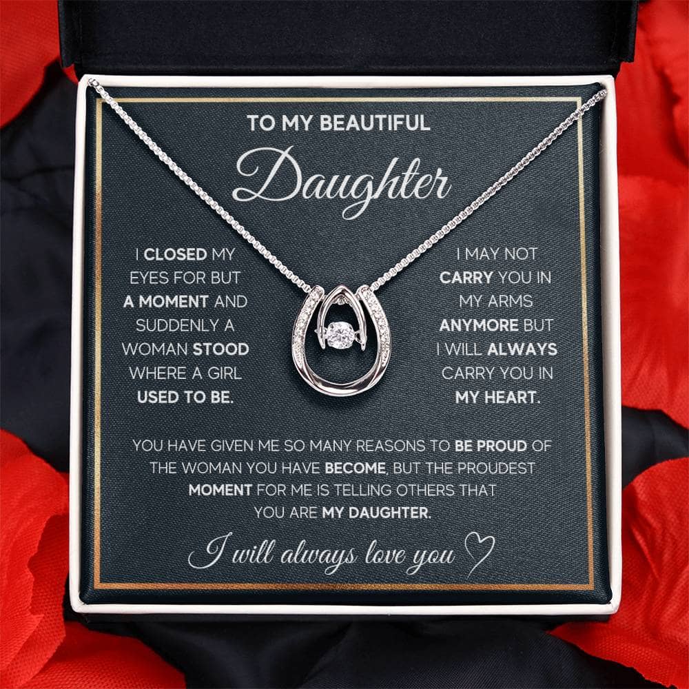 A necklace in a box, symbolizing the bond between parents and daughters. Personalized Daughter Necklace - Symbol Of Love And Bond.