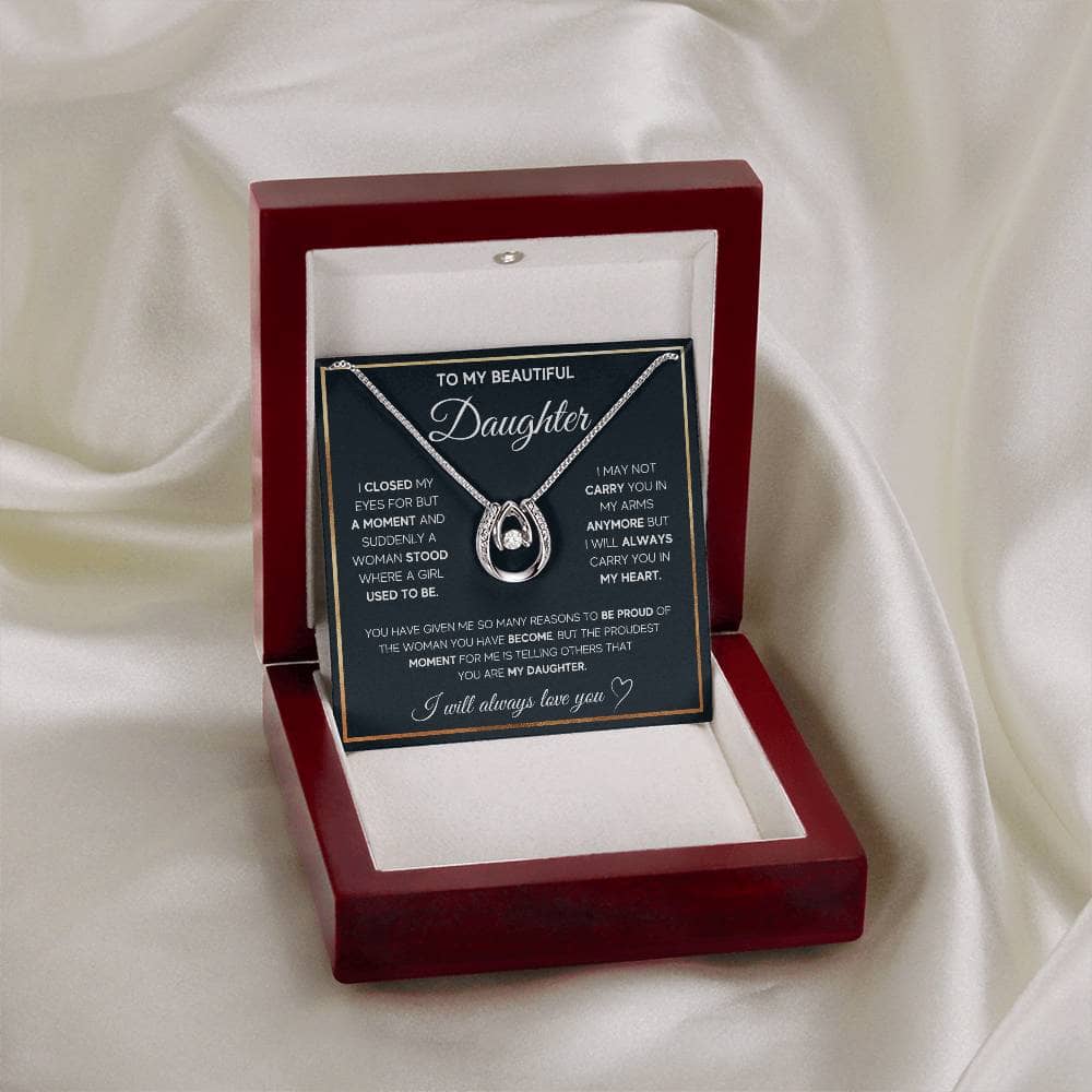 Alt text: "Personalized Daughter Necklace in a box, symbolizing love and bond - a heart-shaped pendant with cubic zirconia on an adjustable chain."
