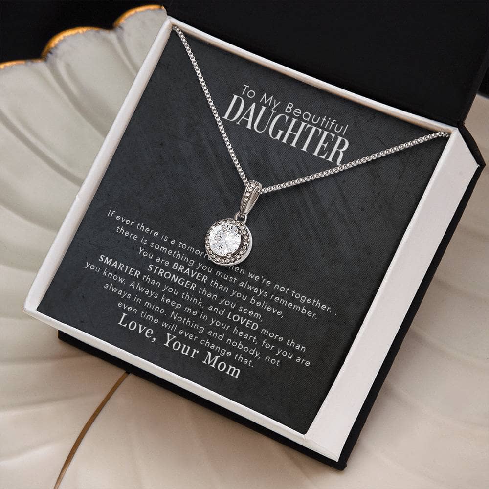 Alt text: "Personalized Daughter Necklace in mahogany-style box with LED lighting, featuring cushion-cut cubic zirconia gem pendant"