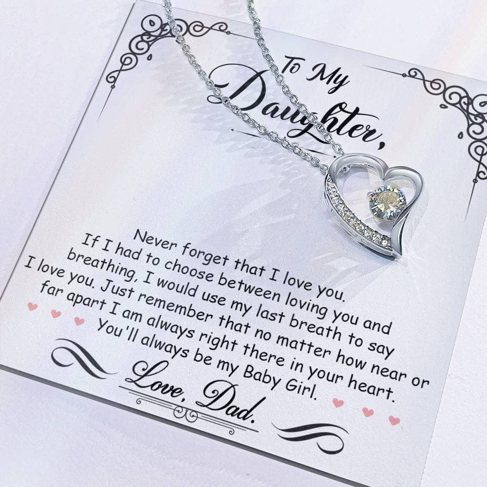 Alt text: "Close-up of heart-shaped pendant on Personalized Daughter Necklace, symbolizing unbreakable love and bond between parents and daughters."
