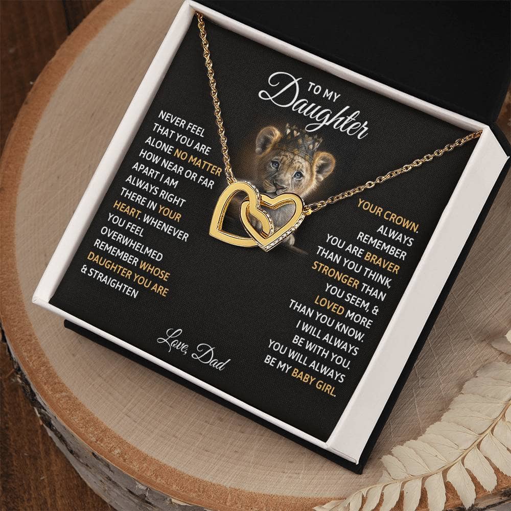 Alt text: "A personalized daughter necklace with twin hearts in a box"