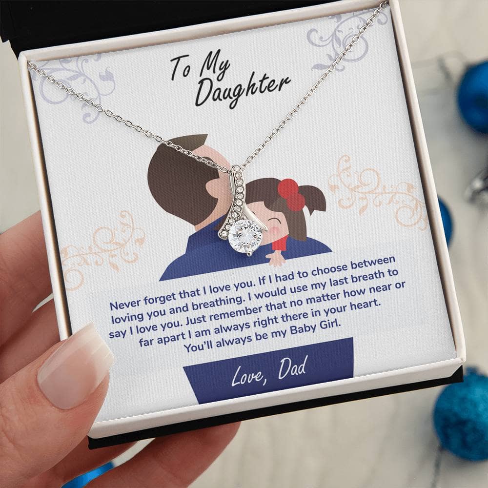 Alt text: "A hand holding a Personalized Daughter Necklace with Cubic Zirconia Pendant, symbolizing enduring love and a cherished bond between a parent and daughter."