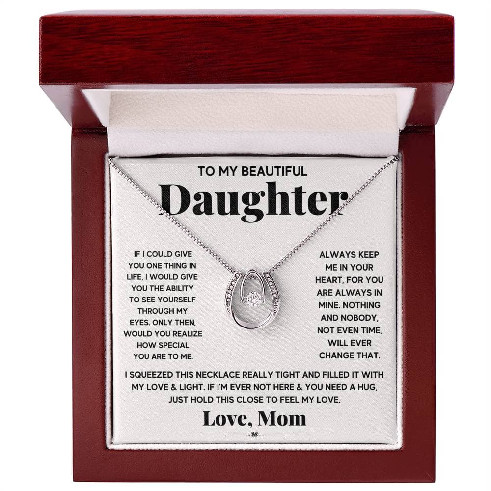 A personalized daughter necklace with a cushion-cut cubic zirconia pendant, elegantly presented in a mahogany-style box with LED lighting.