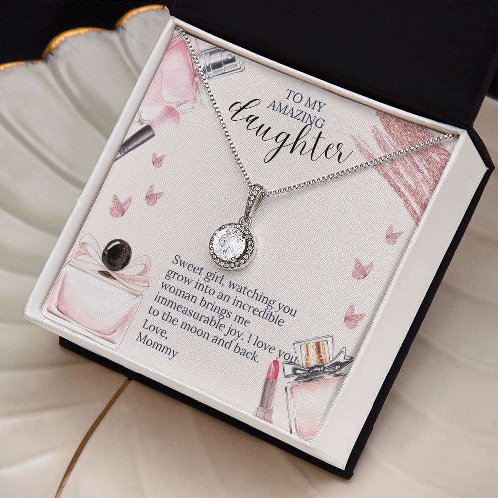 Alt text: "Forever Beloved Necklace - a close-up of a diamond necklace in a box, symbolizing the infinite bond between a mother and her daughter."