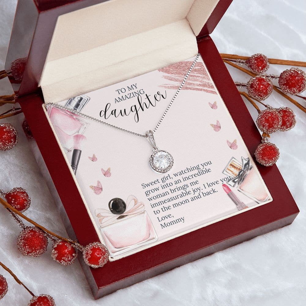 Alt text: "Forever Beloved Necklace in a box with a note, symbolizing the eternal bond between a mother and her daughter."