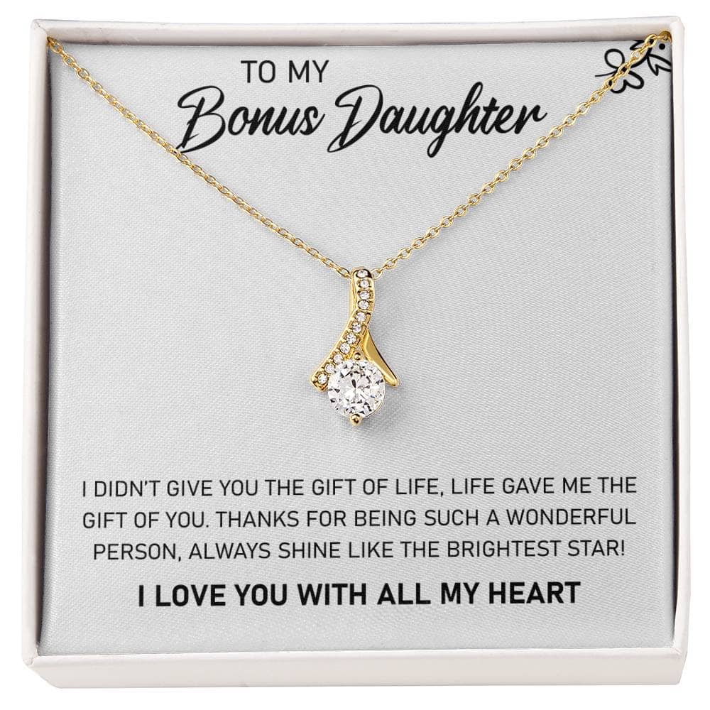 Alt text: "Personalized Daughter Necklace with Heart-shaped Pendant in a box, featuring a close-up of a diamond."
