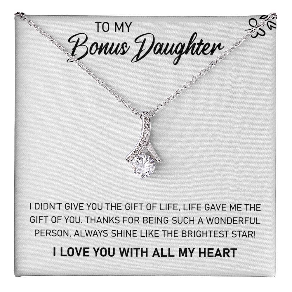 A necklace with a heart-shaped pendant, symbolizing the unbreakable bond between parents and daughters. Crafted with care and quality materials, this Personalized Daughter Necklace is a beautiful expression of love and connection.
