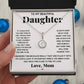 A hand holding a Personalized Daughter Necklace with Zirconia Heart Pendant in a box.
