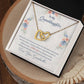 Alt text: "Personalized Granddaughter Love Pendant in a box - a gold heart necklace symbolizing the unyielding bond between grandparents and granddaughter."