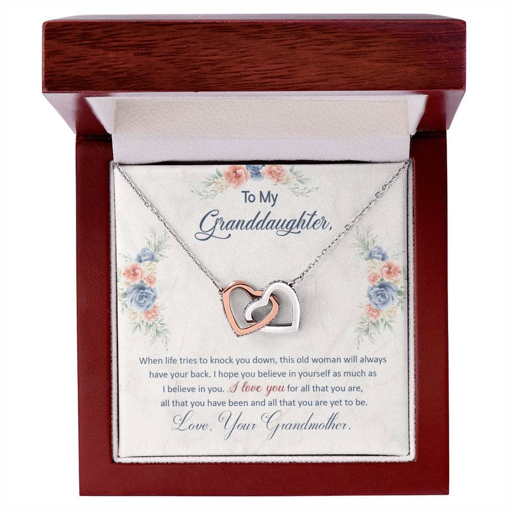 Alt text: "Personalized Granddaughter Love Pendant in a mahogany-styled box with LED lighting enhancement"