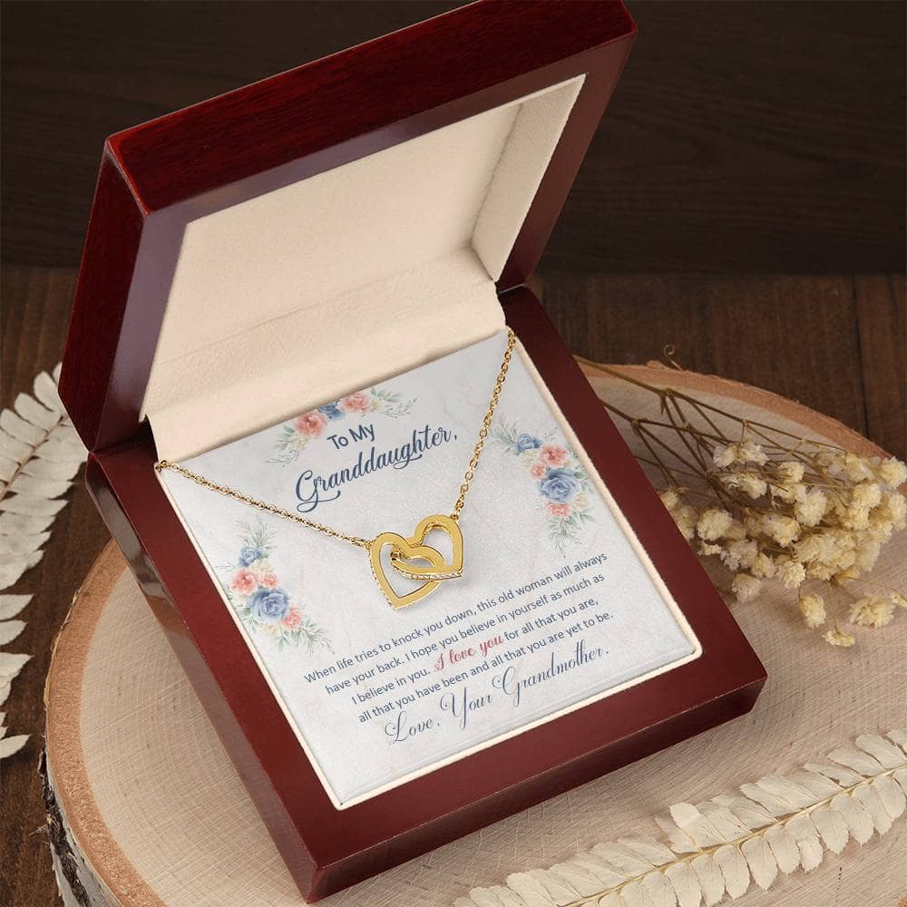 Alt text: "Personalized Granddaughter Love Pendant in a luxury box with LED lighting enhancement"