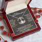 Alt text: "Personalized Granddaughter Necklace - A necklace in a box with a heartfelt message"