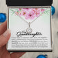 A hand holding a Personalized Granddaughter Necklace - Eternal Hope Design in a box.